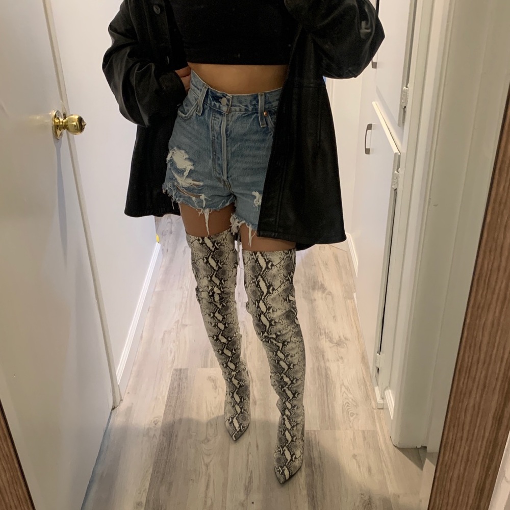 Steve Madden thigh high snake print boots
